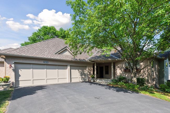 Three-car garage: room for toys, tools, and more. | Image 36