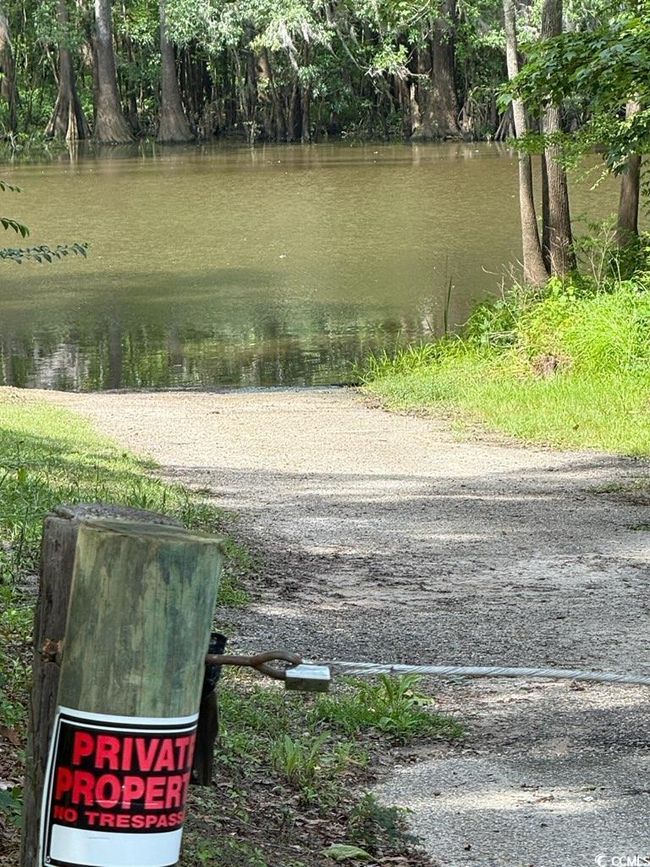 View of yard featuring a water view | Image 40