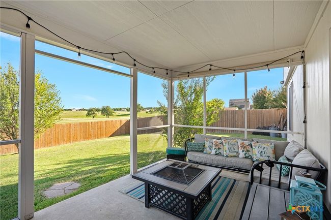 Screened back patio | Image 21