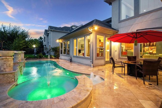 The SALTWATER Pool measures 2.5 feet at its shallow end & 7 feet and its deep end. Remote control handles the water features, lights, cleaner etc. | Image 36