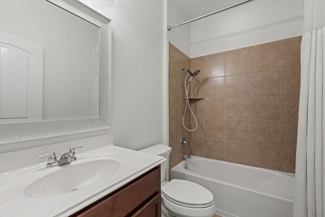 Full bathroom at front of home | Image 18
