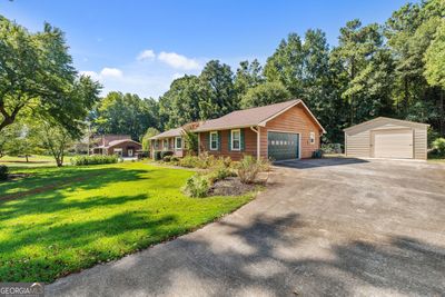 80 Country Roads Drive, House other with 3 bedrooms, 2 bathrooms and 2 parking in Stockbridge GA | Image 2