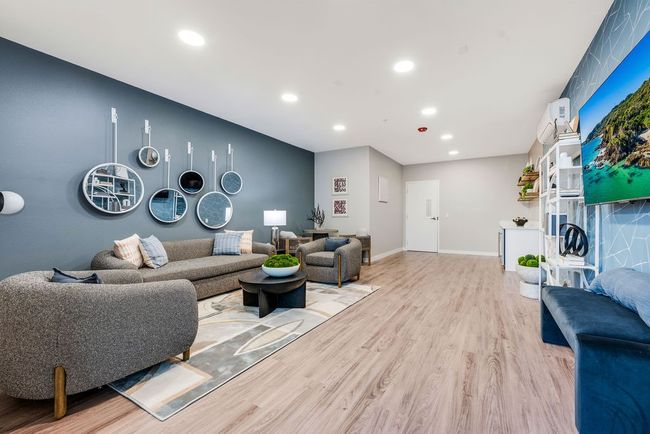 Living room featuring light wood-type flooring, recessed lighting, and baseboards | Image 28