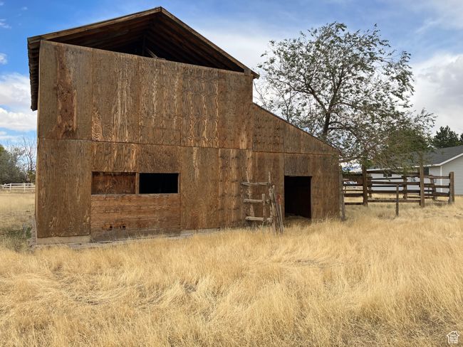 View of barn featuring fence | Image 69