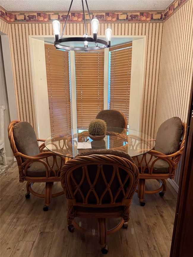 Kitchen nook. Wood look ceramic tile. | Image 7
