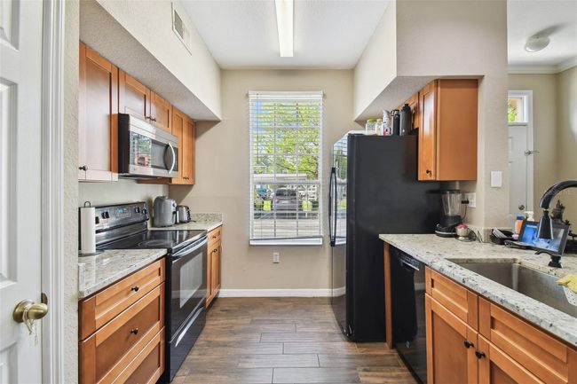 9740 - 9740 Lake Chase Island Way, Condo with 2 bedrooms, 2 bathrooms and null parking in TAMPA FL | Image 10