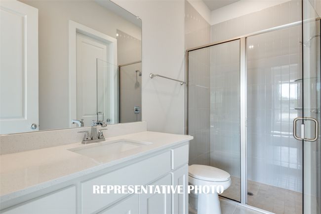 Guests will love the beautiful secondary baths in this fantastic home. REPRESENTATIVE PHOTO. | Image 16
