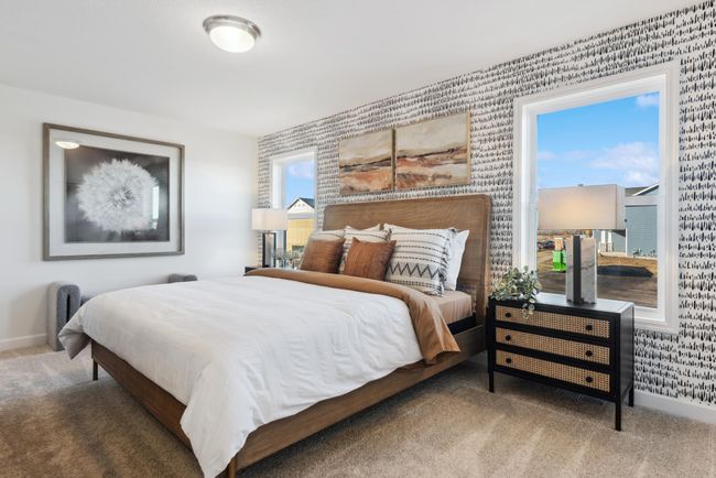 *Photo of model home, actual features may vary. Find your retreat in this stunning owner’s suite. Enjoy the exclusivity of a private bath and walk-in closet. | Image 10