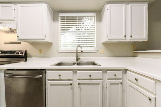 All cabinets repainted with enamel and new hardware. | Image 5