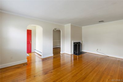 Living room w/fireplace and cute arched doorways | Image 3