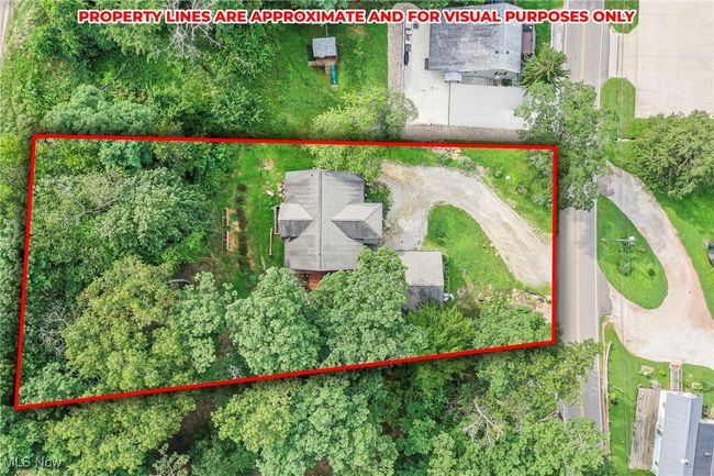 Aerial view of property and surrounding area featuring property boundaries highlighted | Image 49