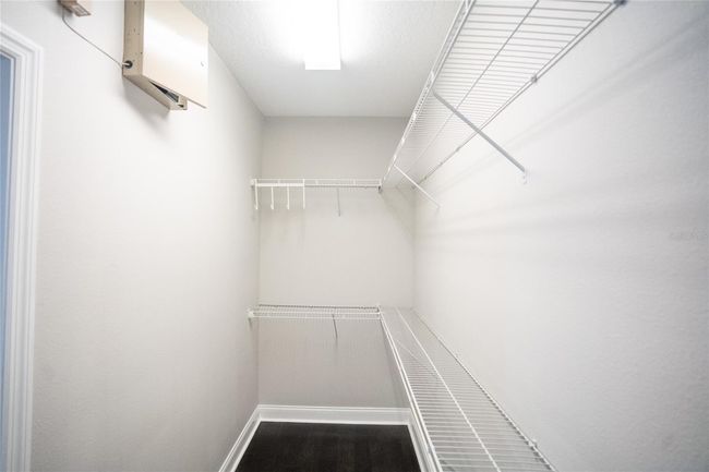 Primary bedroom walkin closet | Image 39
