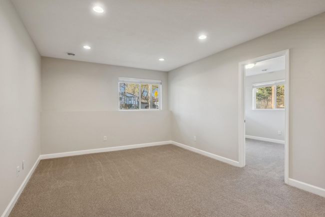 This is the lower level family room. It features new carpet and new paint. Light and bright, fresh and cool. | Image 33