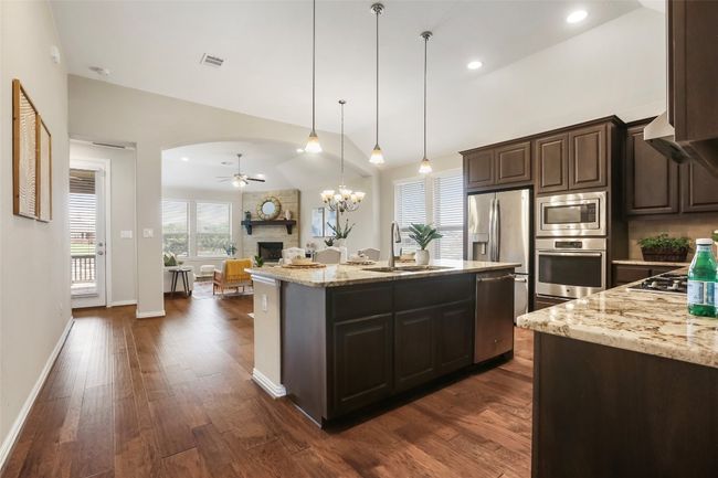 Open kitchen looking onto the family room | Image 6