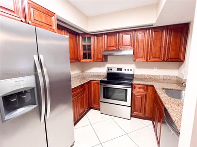 111 - 18890 Nw 57th Ave, Condo with 2 bedrooms, 2 bathrooms and null parking in Hialeah FL | Image 1