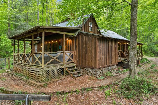 85 Clear Lake Ct, Home with 3 bedrooms, 2 bathrooms and null parking in Ellijay GA | Image 4