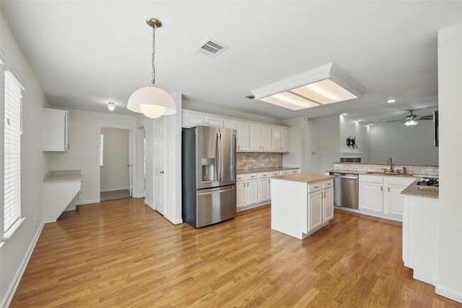 There is enough space for your family dining table! | Image 15
