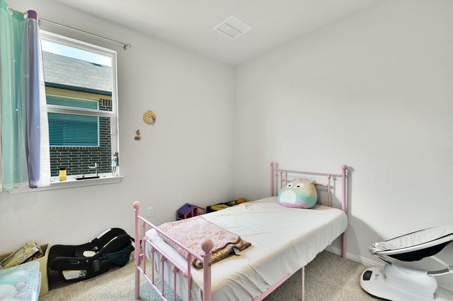 Bedroom featuring carpet flooring and baseboards | Image 24