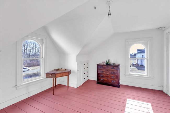 Additional living space featuring light wood-type flooring and vaulted ceiling | Image 20