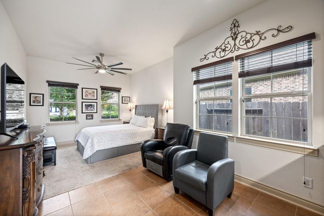 Also on the first floor is this amazing guest suite complete with its own sitting area, full bath, and kitchenette. | Image 26