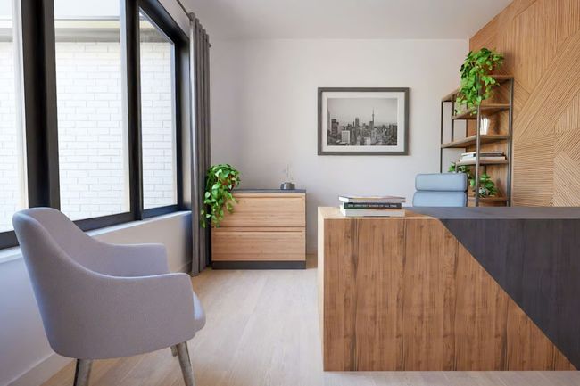 Custom-milled wood accent wall adds contemporary texture and style to the office space. | Image 5