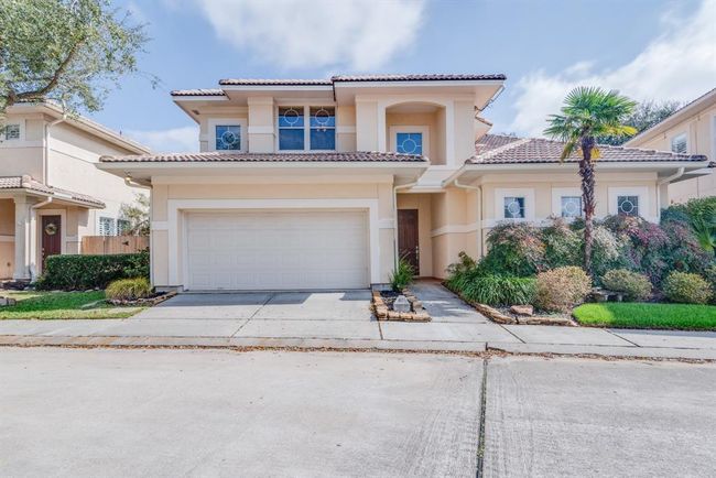 Gorgeous mediterranean style home with two car garage and lush landscaping. 403 Harborside Way is ready for you to make it your dream home. | Image 48