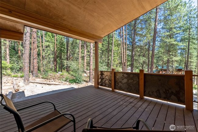 Covered patio accessed off of kitchen. Another dining option in summertime. | Image 21