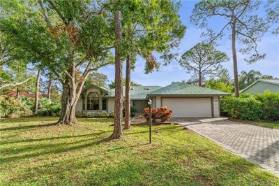 5199 Sw Landing Creek Drive, House other with 3 bedrooms, 2 bathrooms and 2 parking in Palm City FL | Image 1