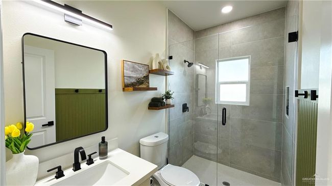 Full bathroom with vanity and a stall shower | Image 8
