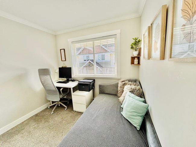 Office area with carpet flooring and ornamental molding | Image 23