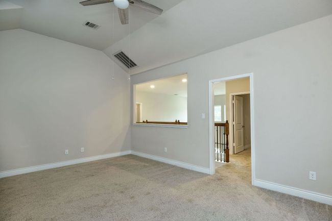 Heading upstairs, you are welcomed by the very large bonus room, perfect for kids or even a media room. | Image 15