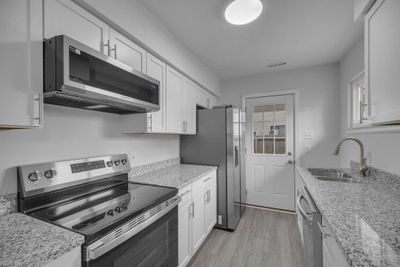 Updated Kitchen with New Cabinets, Granite Countertops, & Stainless Steel Appliance Package | Image 3