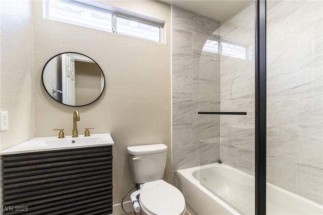 Downstairs full bath | Image 19