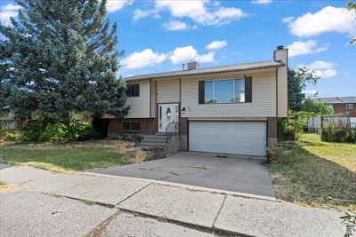 876 N Dorothea Way W, House other with 4 bedrooms, 2 bathrooms and 4 parking in Salt Lake City UT | Image 1