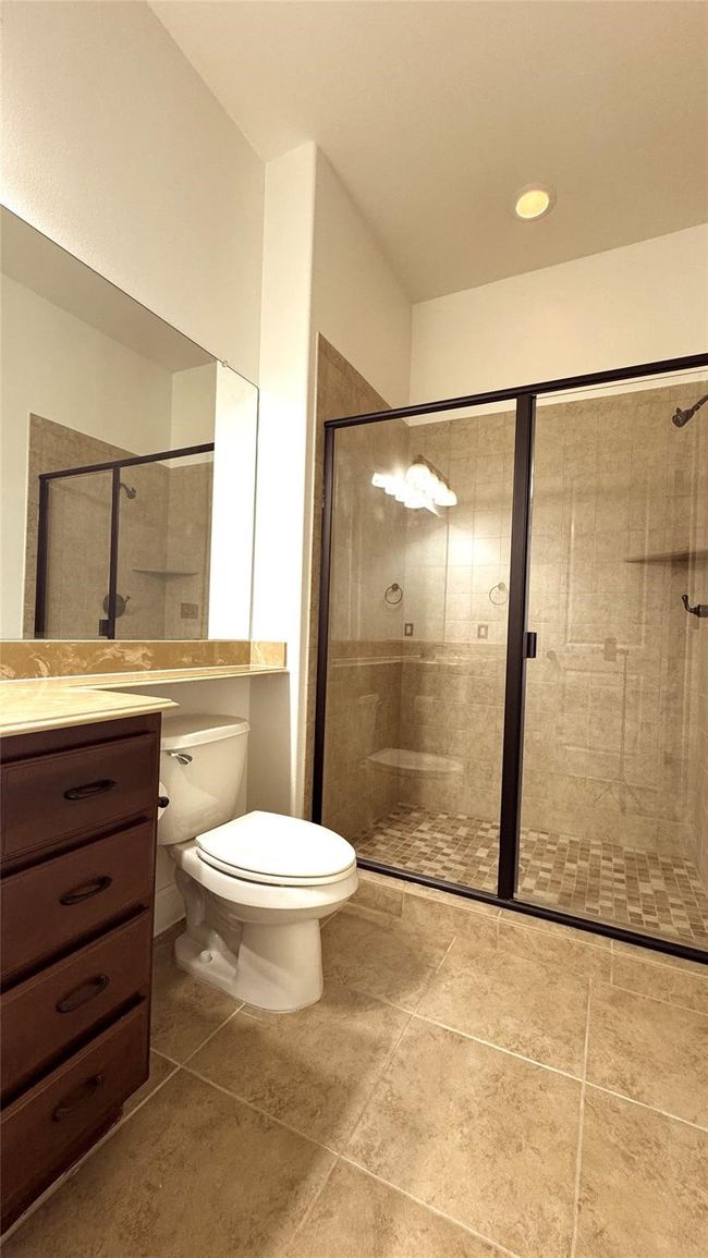 Full bathroom featuring vanity and a stall shower | Image 11