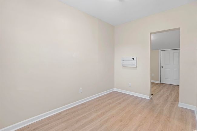 Spare room with light wood-style floors and baseboards | Image 35