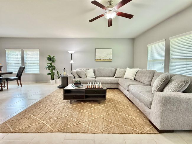 Relax or Entertain in the spacious family room | Image 5