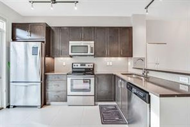 51 Sherwood Row Nw, Home with 2 bedrooms, 2 bathrooms and 3 parking in Calgary AB | Image 4