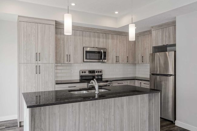 282 Canals Cross Sw, Townhouse with 3 bedrooms, 3 bathrooms and 2 parking in Airdrie AB | Image 6