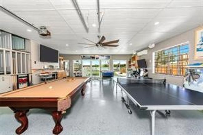 Game room with ceiling fan, billiards, and recessed lighting | Image 21