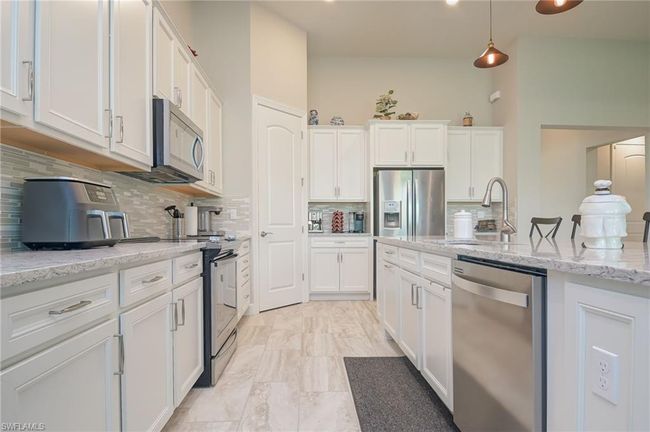 Kitchen with walk-in pantry | Image 5