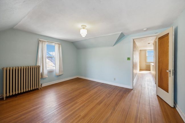 Upstairs bedroom is good sized. | Image 17