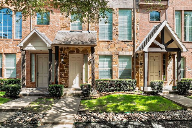View of front of property with stone siding and brick siding | Image 12