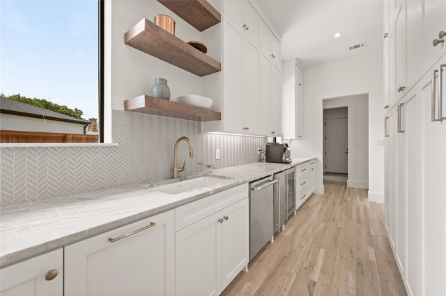 Scullery Kitchen with open shelves, a sink, 2nd dishwasher, ice maker and wine fridge | Image 15