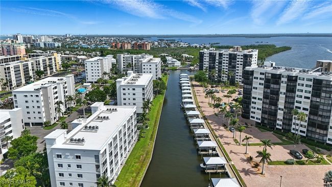 View of urban area with a large body of water | Image 4