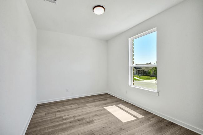 Unfurnished room featuring wood finished floors | Image 18