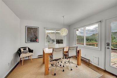 Dining room with deck access and mountain views | Image 3