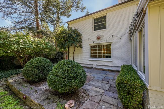 Rear view of property with a patio and brick siding | Image 34