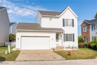 Front of property with a front yard and a garage | Image 2