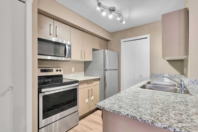 1205 - 4641 128 Avenue Ne, Home with 2 bedrooms, 2 bathrooms and 1 parking in Calgary AB | Image 1